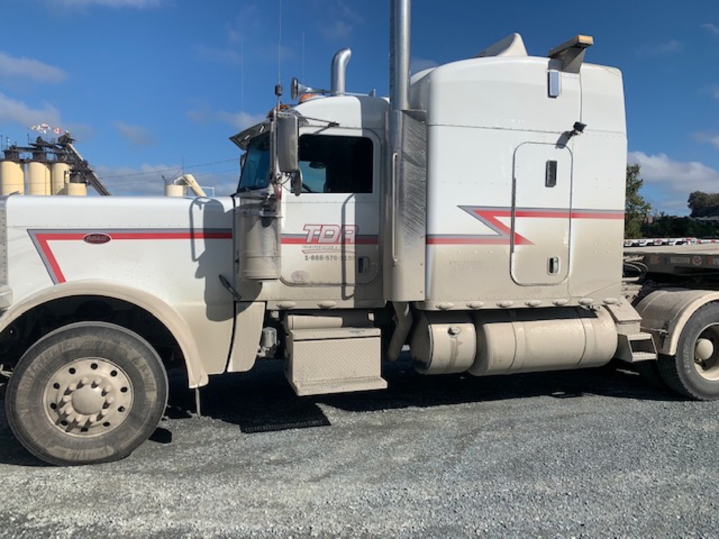 Highway tractor before washing, heavy dirt build up