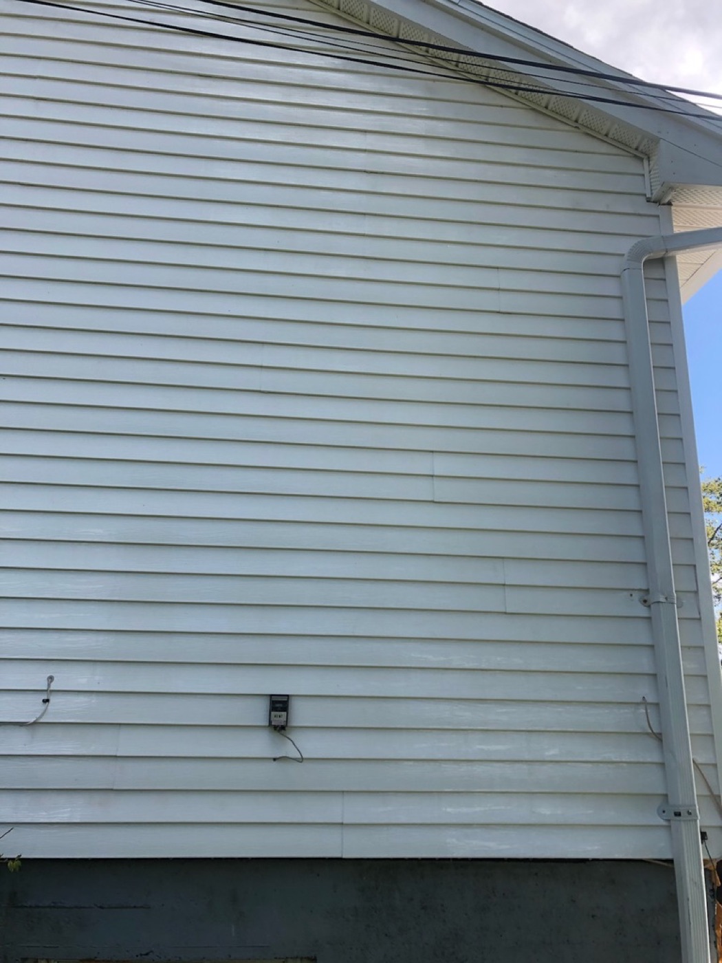 House siding after washing by O'Brien's Faster Blaster