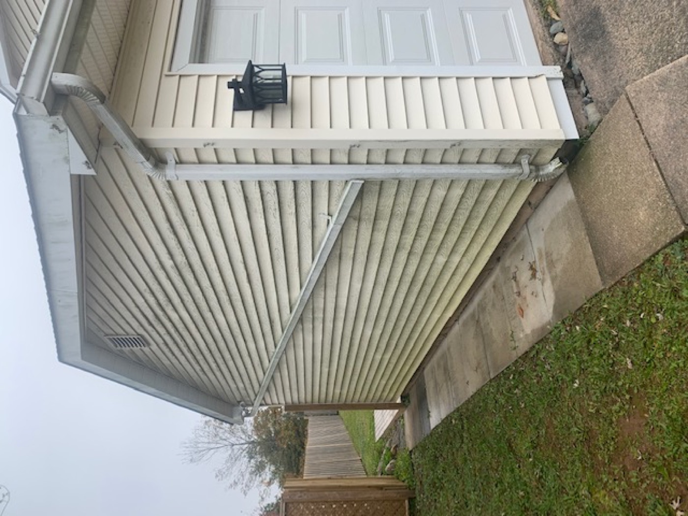 Vinyl siding before washing, heavy dirt build up